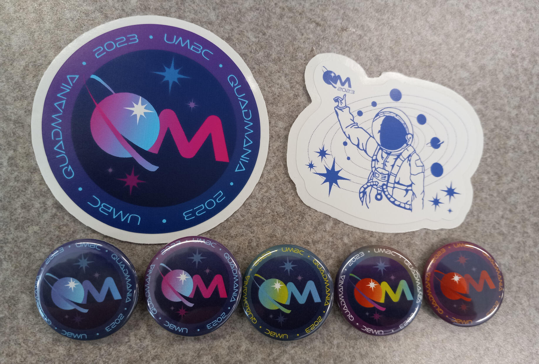 Quadmania stickers and button badges (Astronaut by Sarah Rashid)